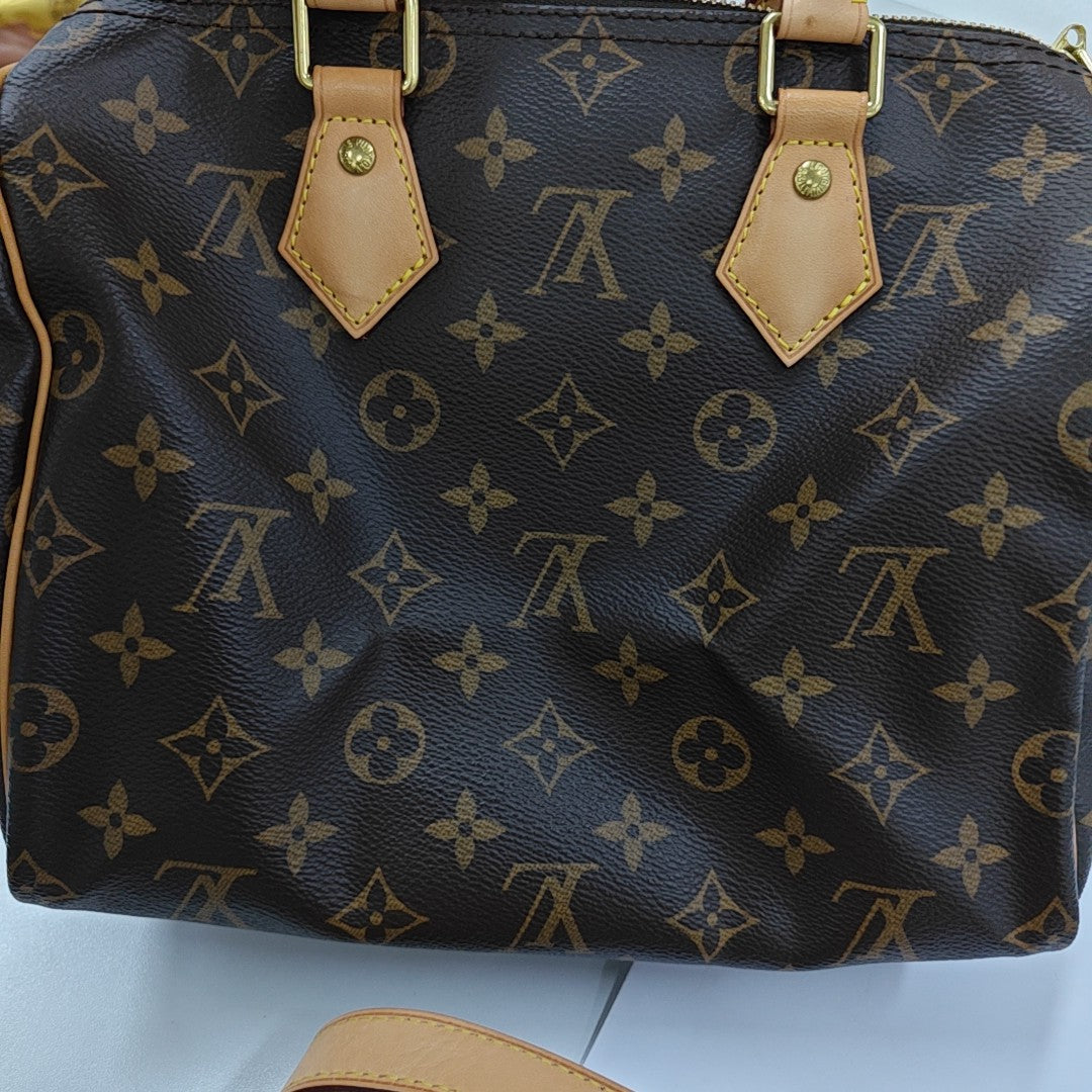 SPEEDY 25 Monogram Coated Canvas Brown