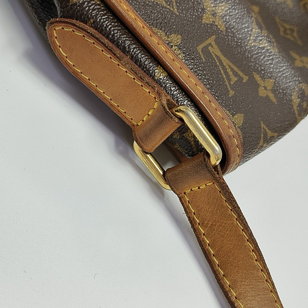 MENILMONTANT PM Monogram Coated Canvas Brown