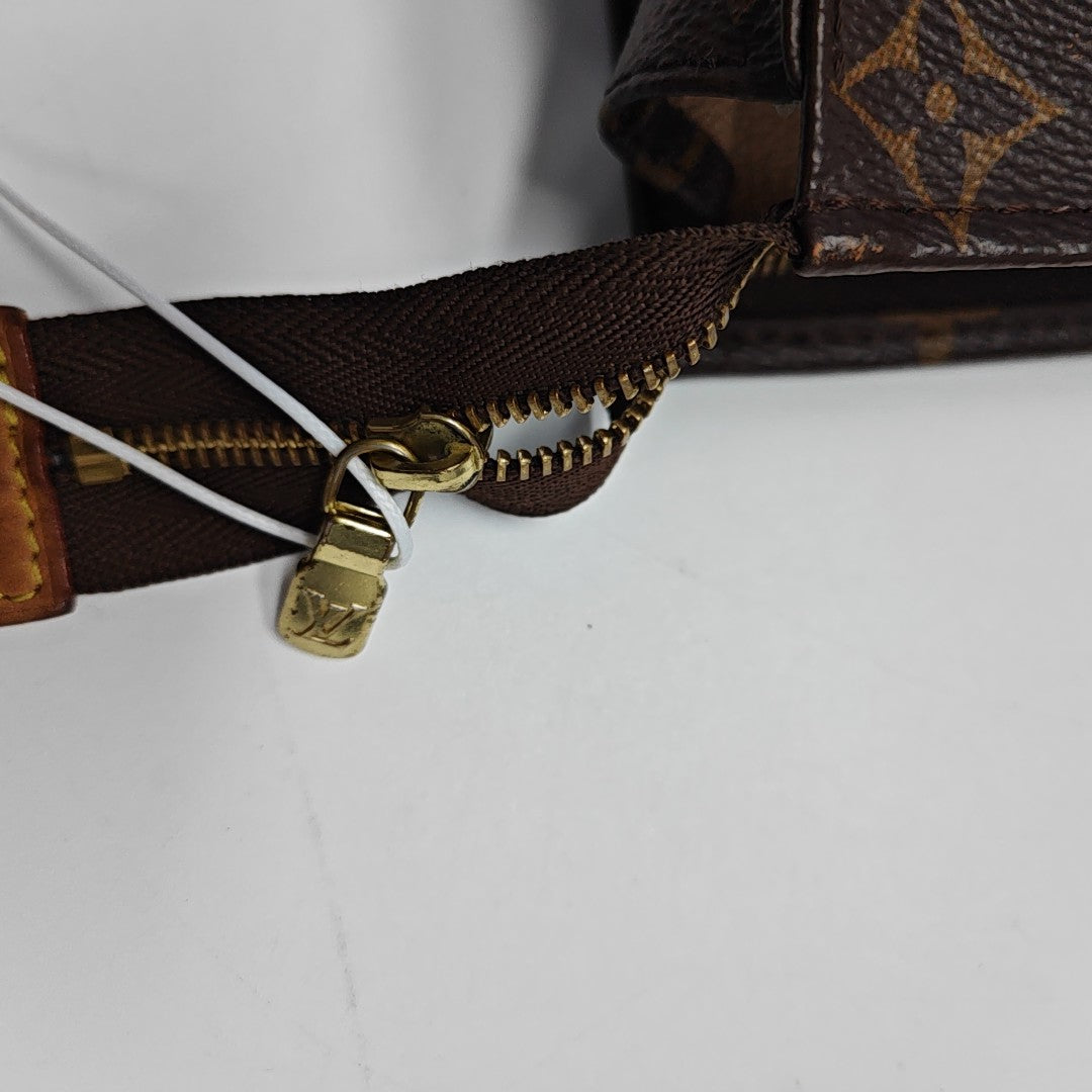 TOILET POCKET 19 Monogram Coated Canvas Brown
