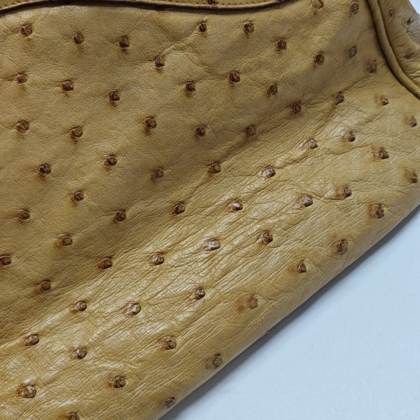 Bolso de mano de avestruz amarillo