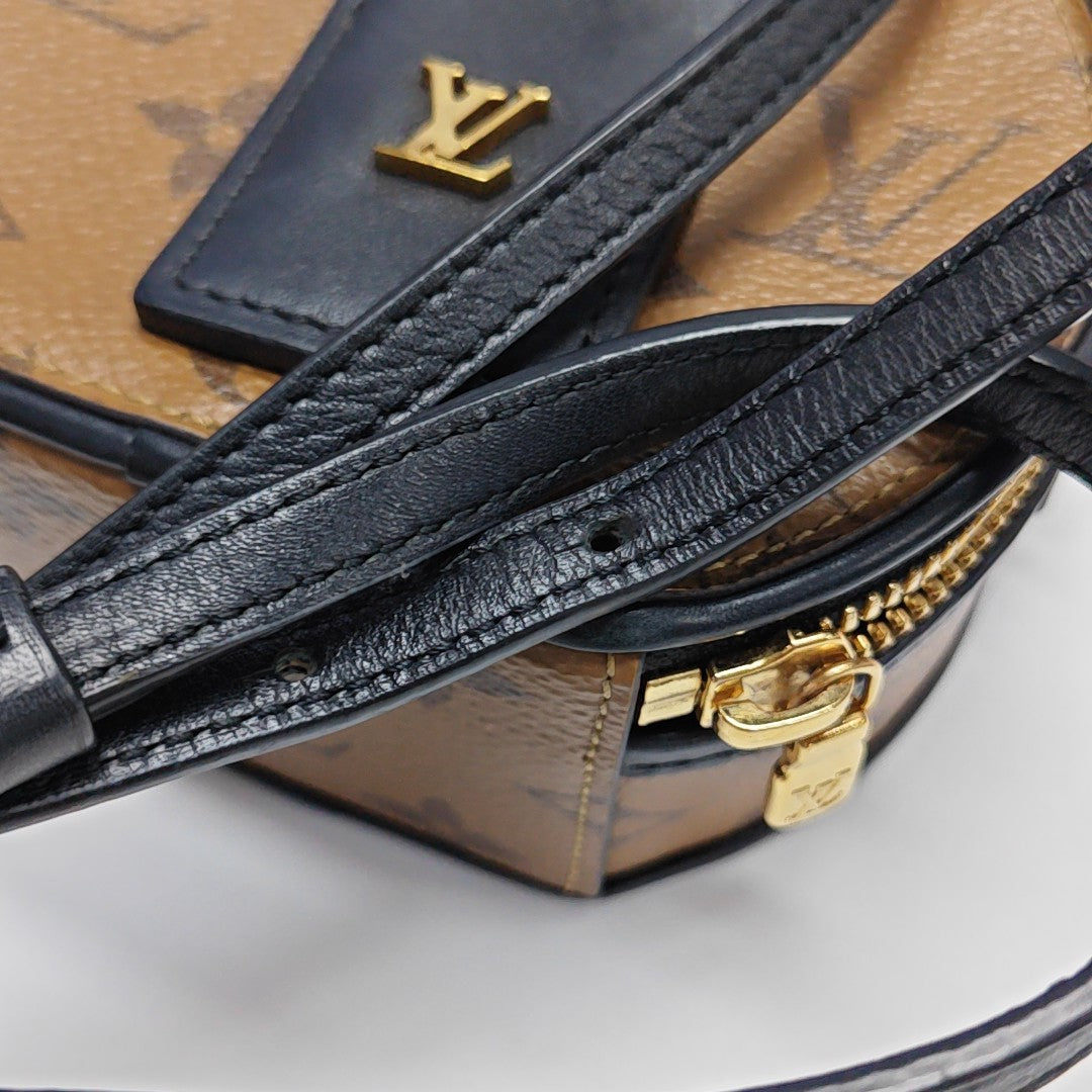 BOITE CHAPEAU Mini Monogram Coated Canvas Brown