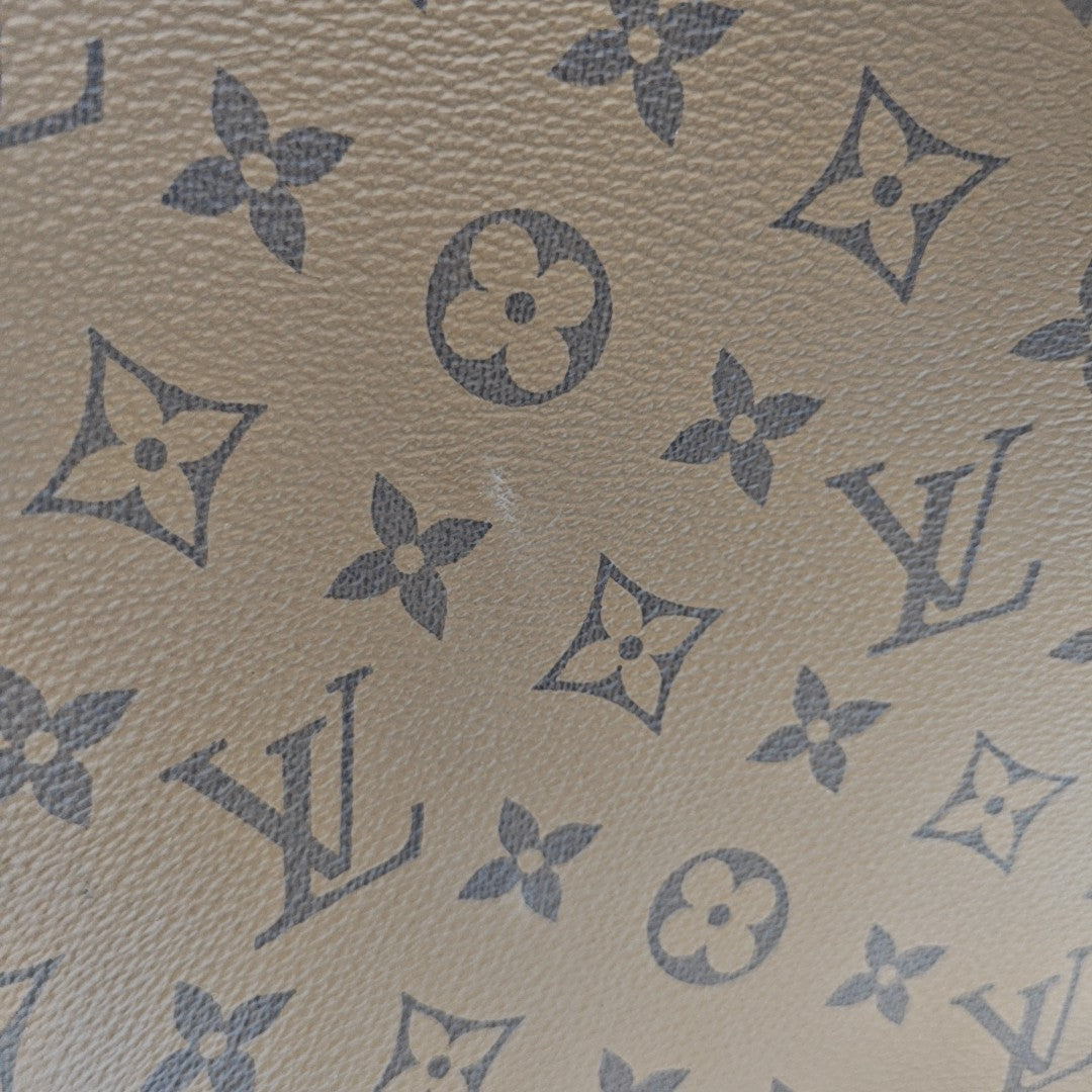 ONTHEGO GM Monogram Coated Canvas Brown