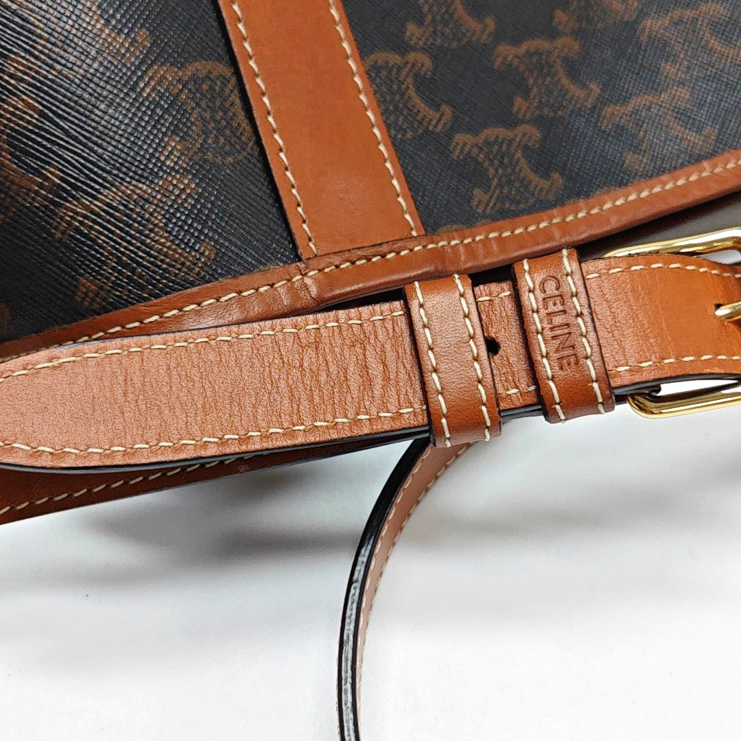 Authenticated pre-owned  TRIOMPHE CANVAS Medium Coated Canvas Brown - Bucket Bag at Looply