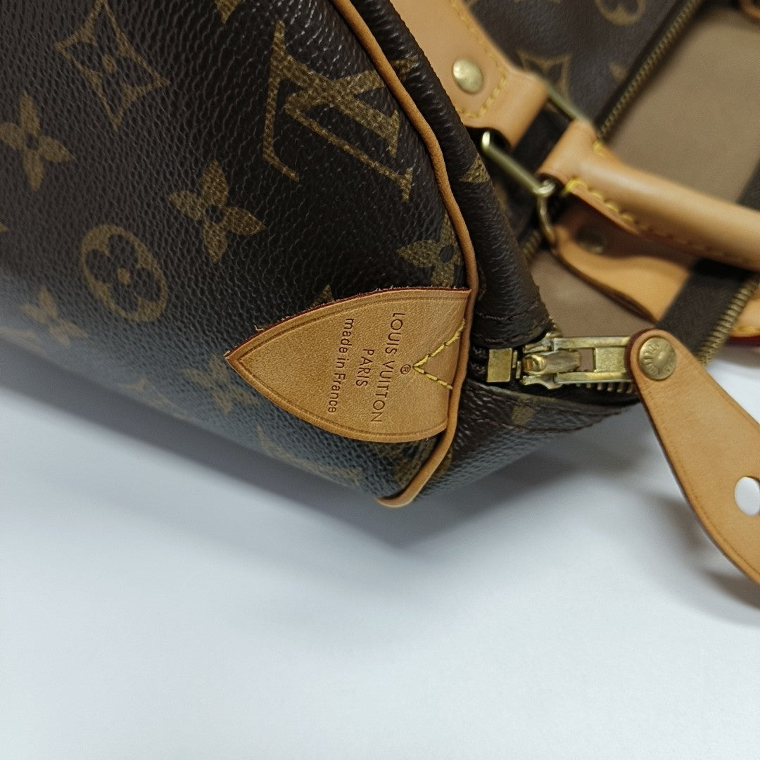 SPEEDY 30 Monogram Coated Canvas Brown