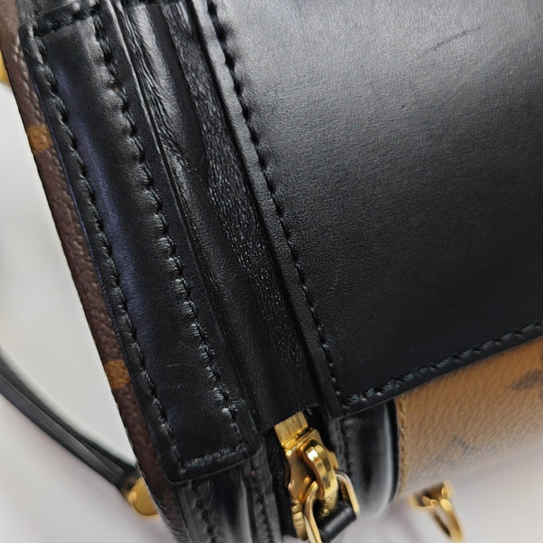 CANNES PM Monogram Coated Canvas Brown