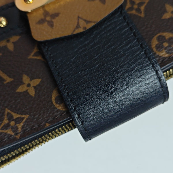 TRUNK Monogram Coated Canvas Brown