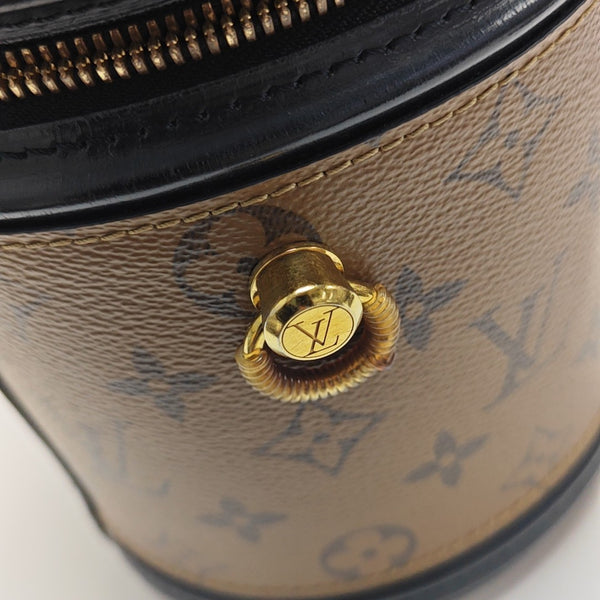 CANNES PM Monogram Coated Canvas Brown