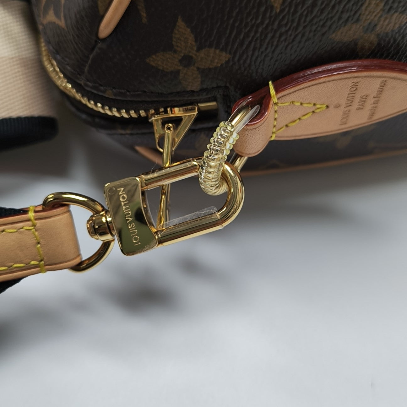 SPEEDY 20 Monogram Coated Canvas Brown