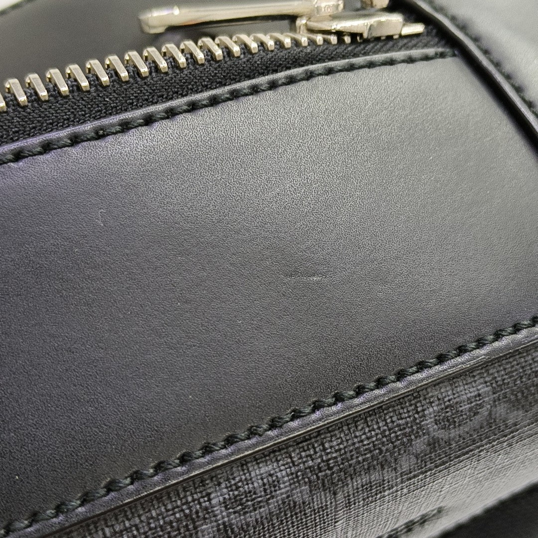 Monogram Coated Canvas Backpack Black