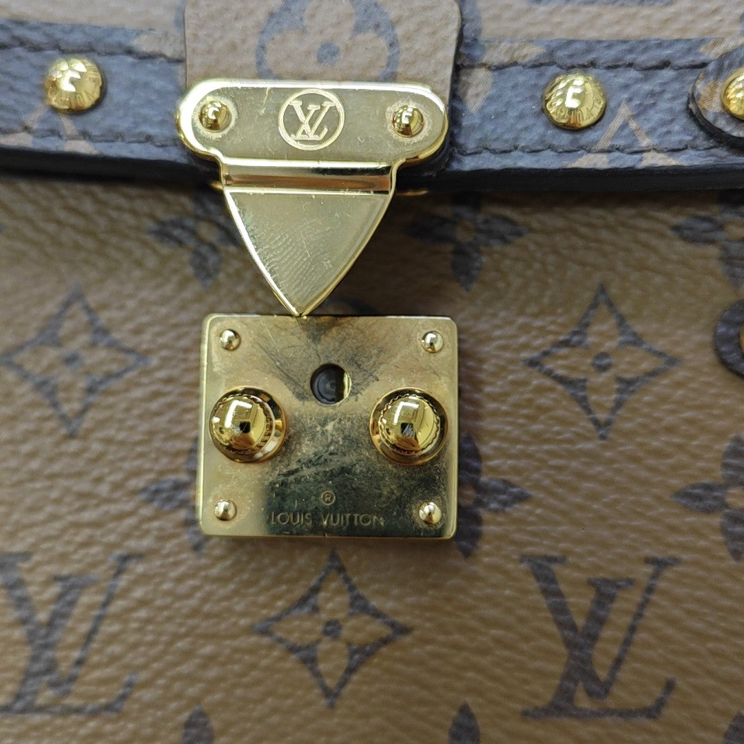 TRUNK Monogram Coated Canvas Brown
