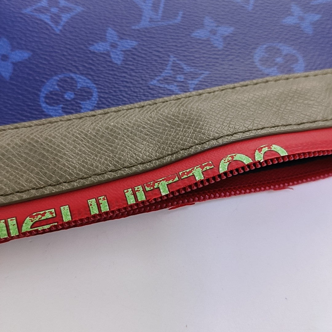 DISCOVERY Monogram Coated Canvas Blue