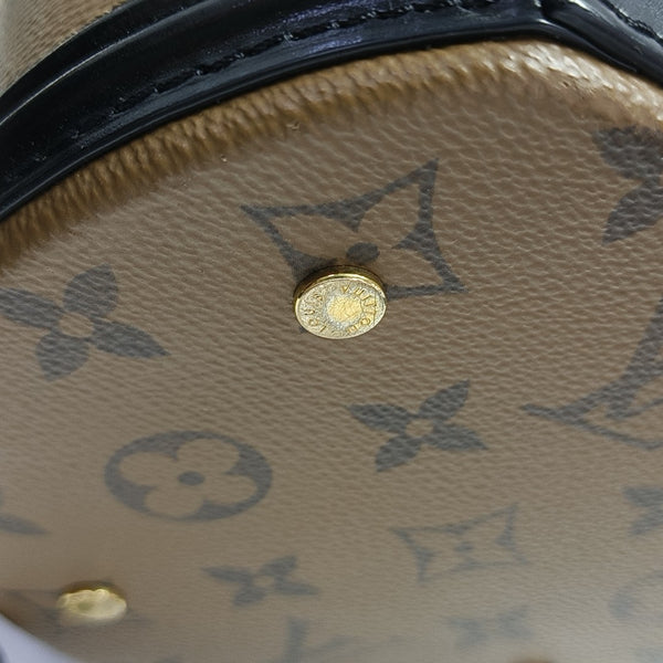 CANNES PM Monogram Coated Canvas Brown