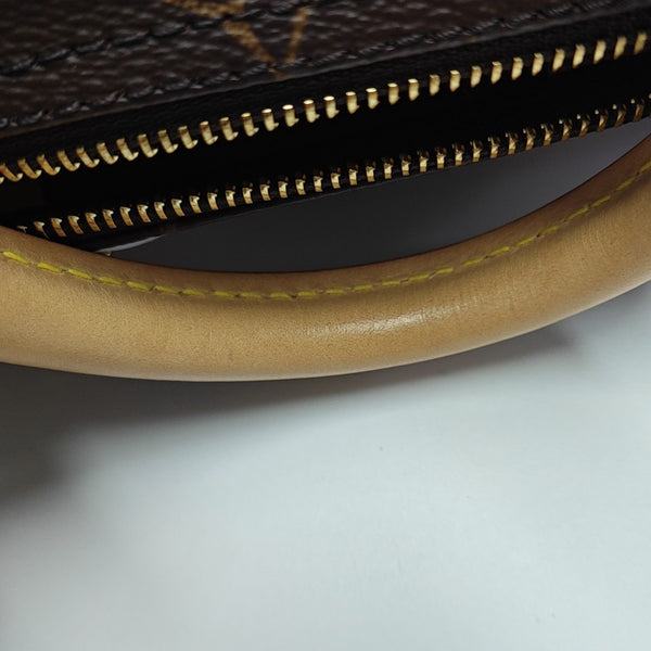 SPEEDY 25 Monogram Coated Canvas Brown