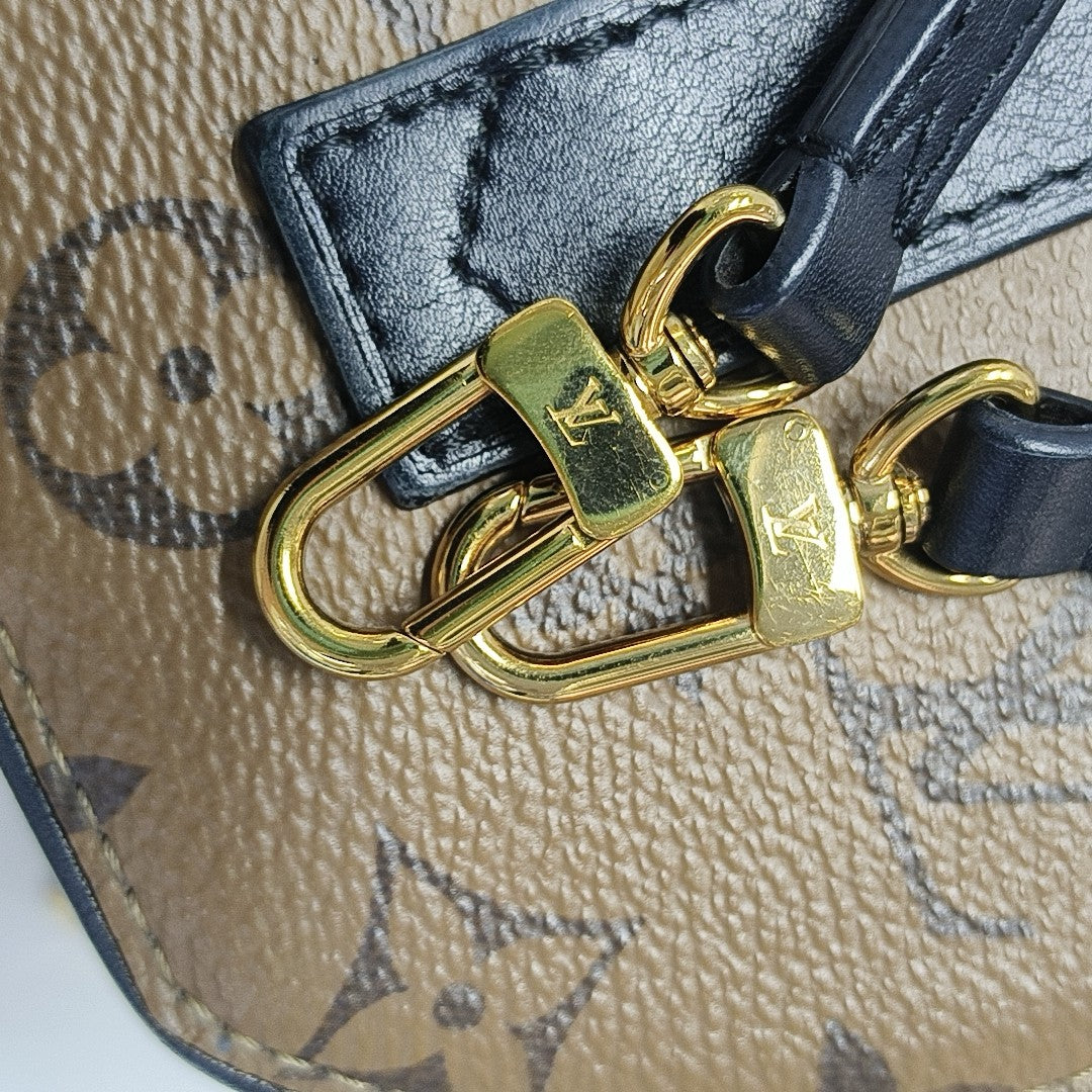 BOITE CHAPEAU Mini Monogram Coated Canvas Brown