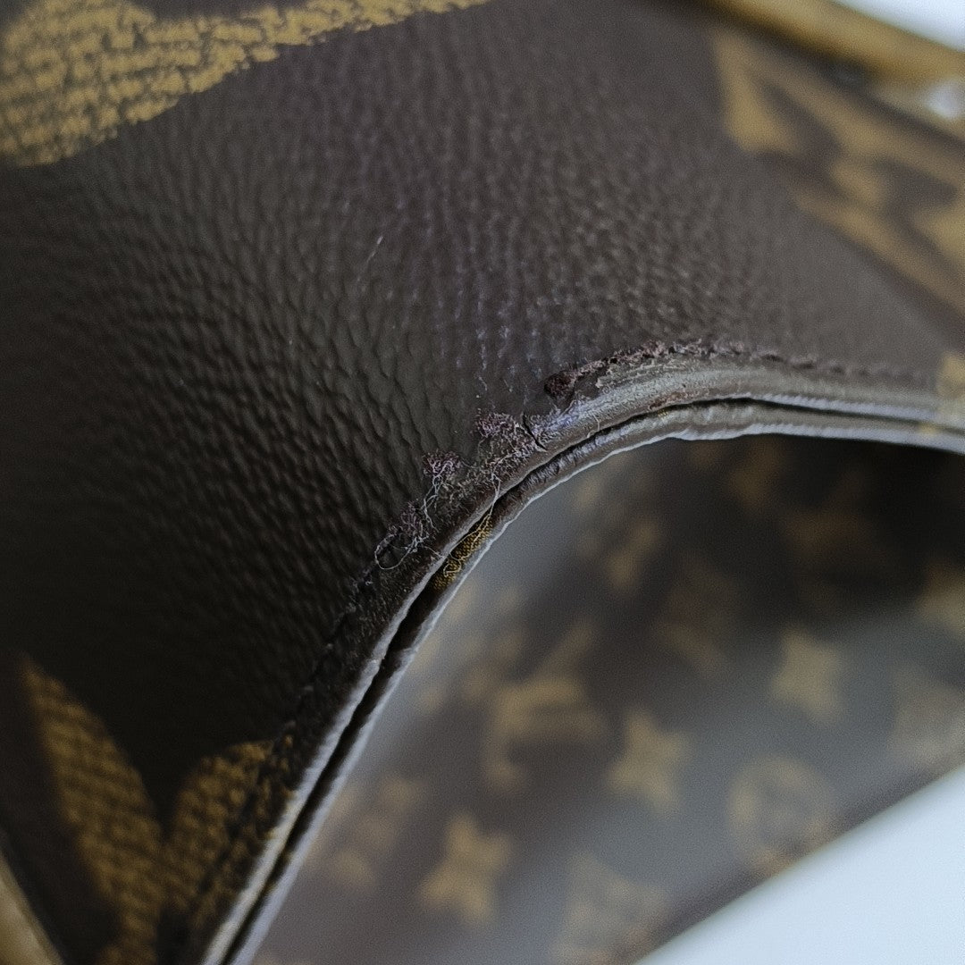 ONTHEGO GM Monogram Coated Canvas Brown