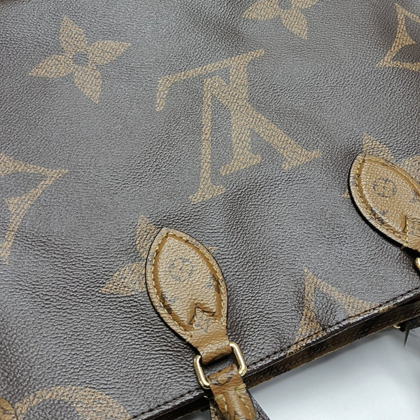 ONTHEGO MM Monogram Coated Canvas Brown