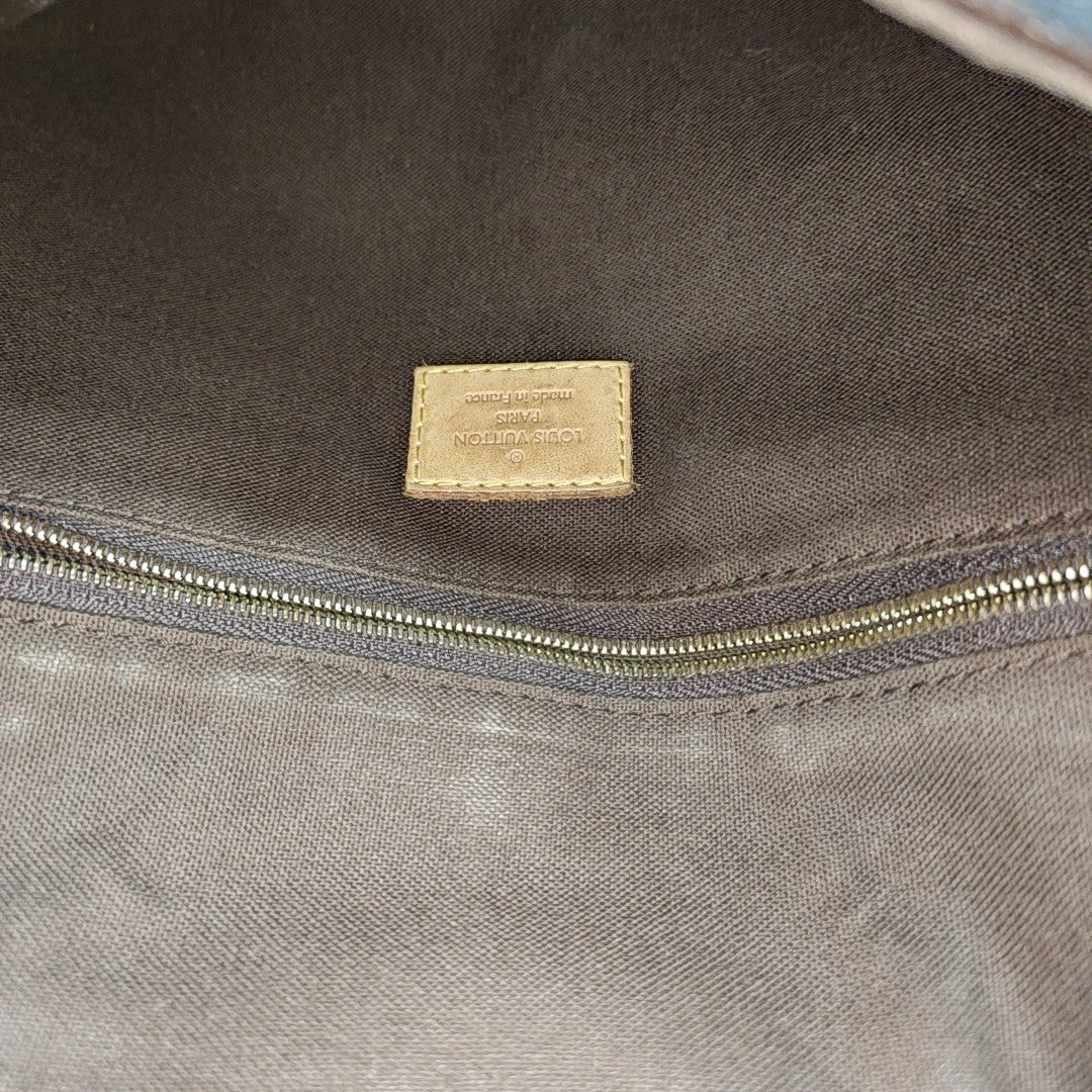 MENILMONTANT PM Monogram Coated Canvas Brown