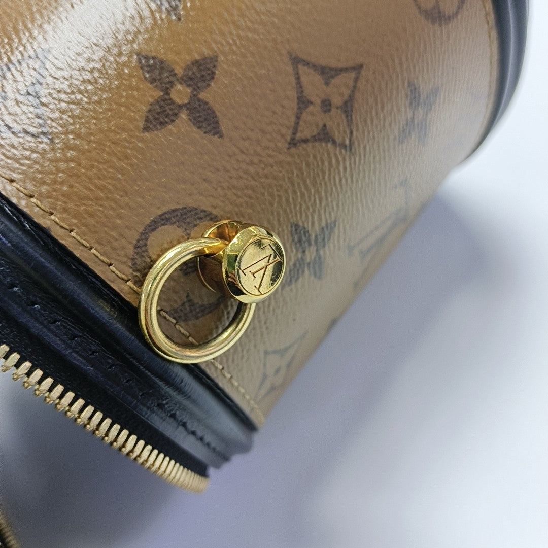 CANNES PM Monogram Coated Canvas Brown