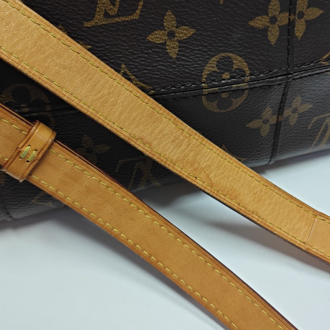 MELIE Monogram Coated Canvas Brown