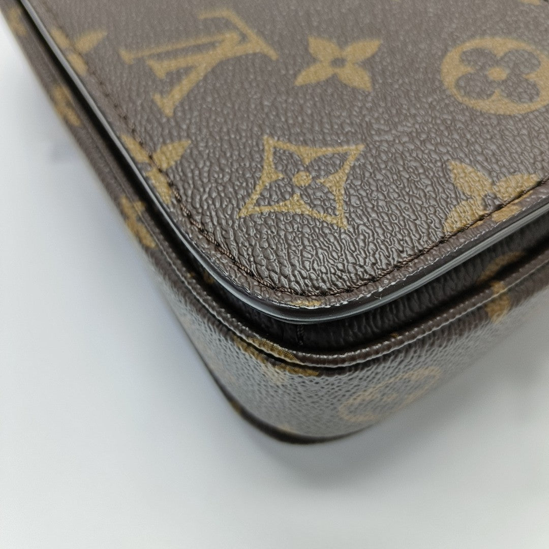 MÉTIS EAST WEST Monogram Coated Canvas Brown