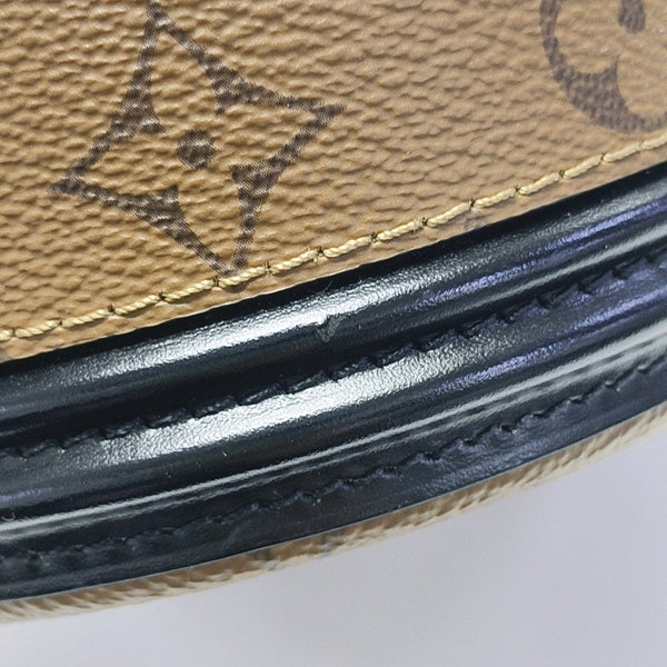 CANNES PM Monogram Coated Canvas Brown