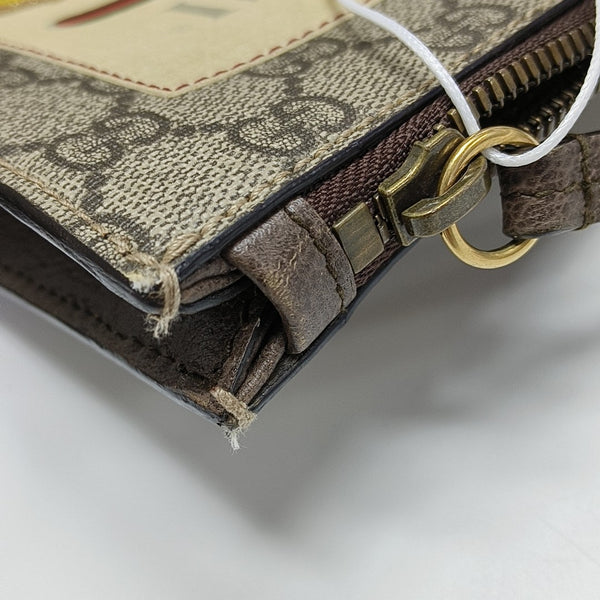 Monogram Coated Canvas Clutch Beige
