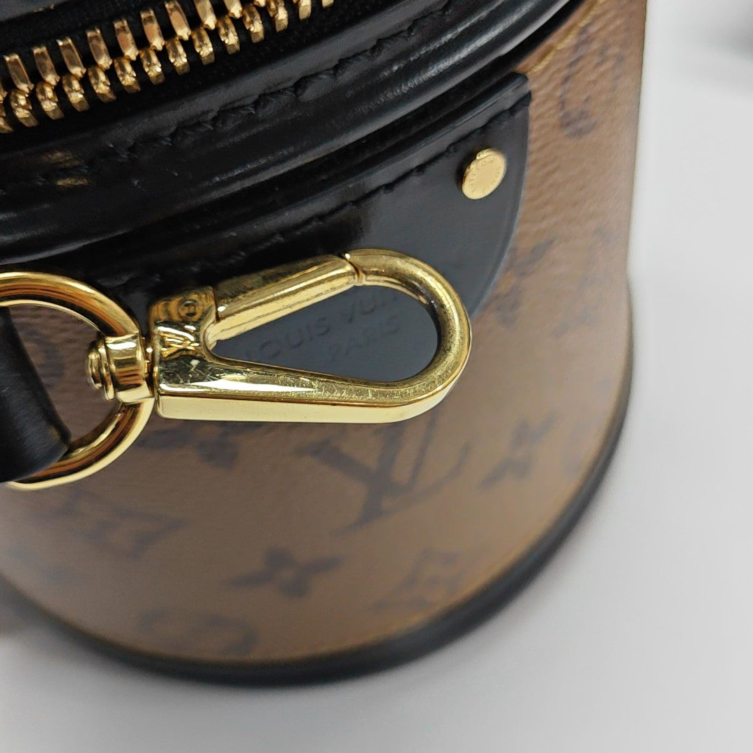 CANNES PM Monogram Coated Canvas Brown