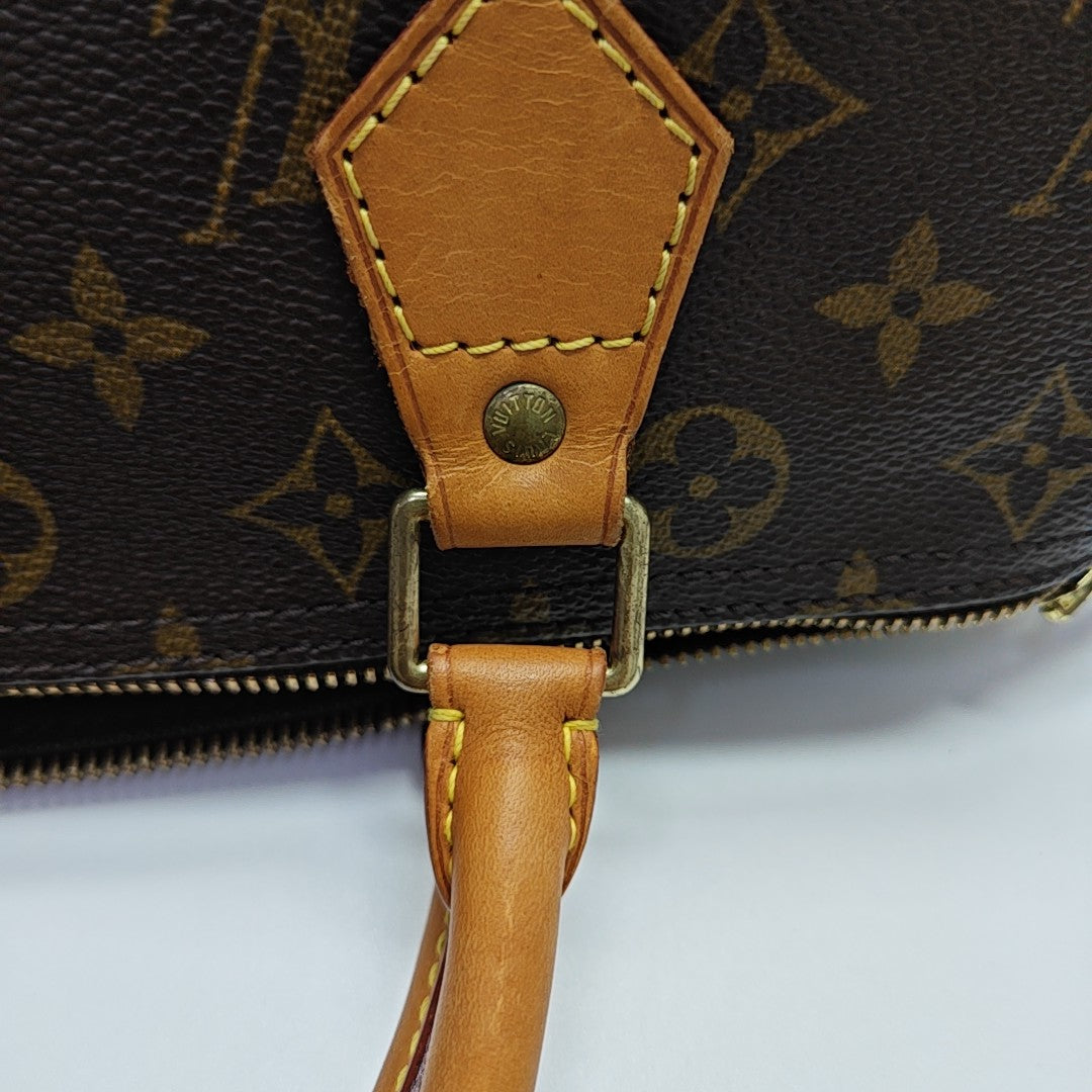 SPEEDY 30 Monogram Coated Canvas Brown