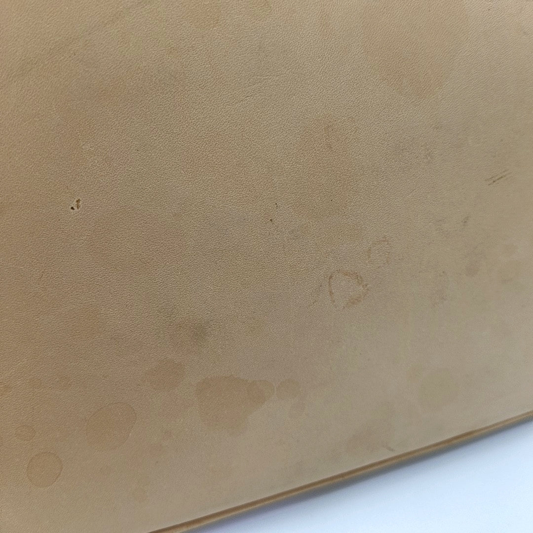 ALMA PM Monogram Coated Canvas Brown