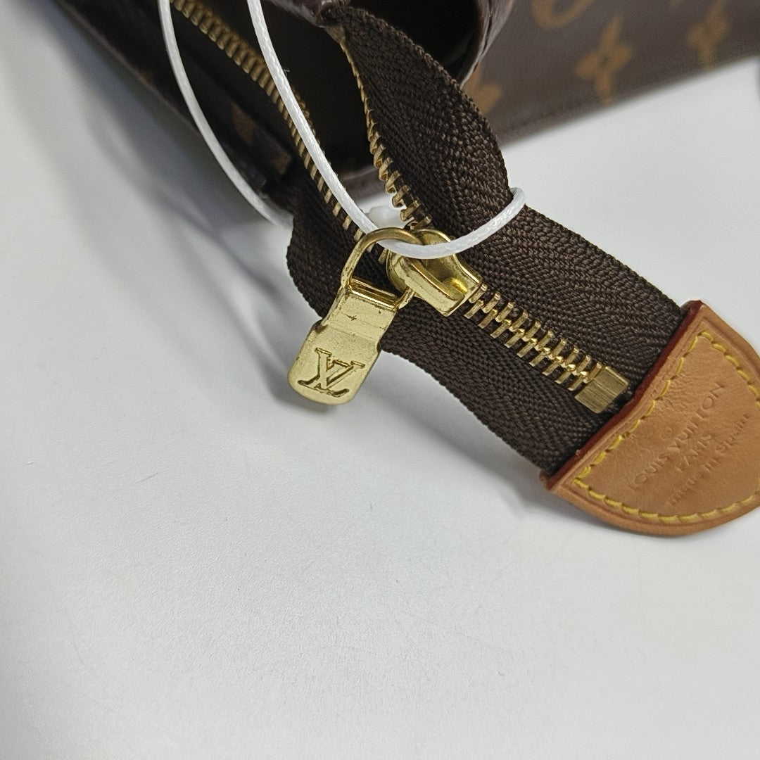 TOILET POCKET Monogram Coated Canvas Brown