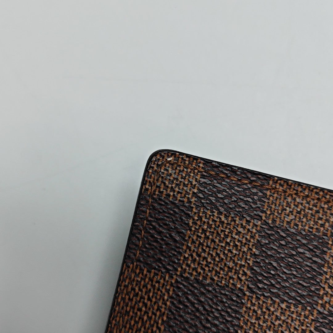 JAMES Damier Ebene Coated Canvas Brown