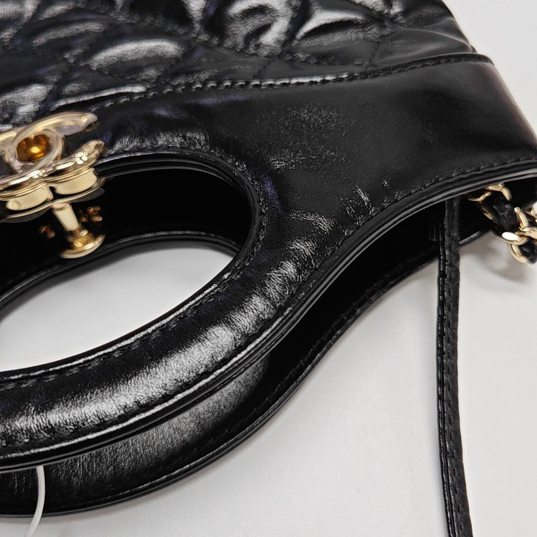 CHANEL 31 Mini Quilted Waxed Cafskin Black