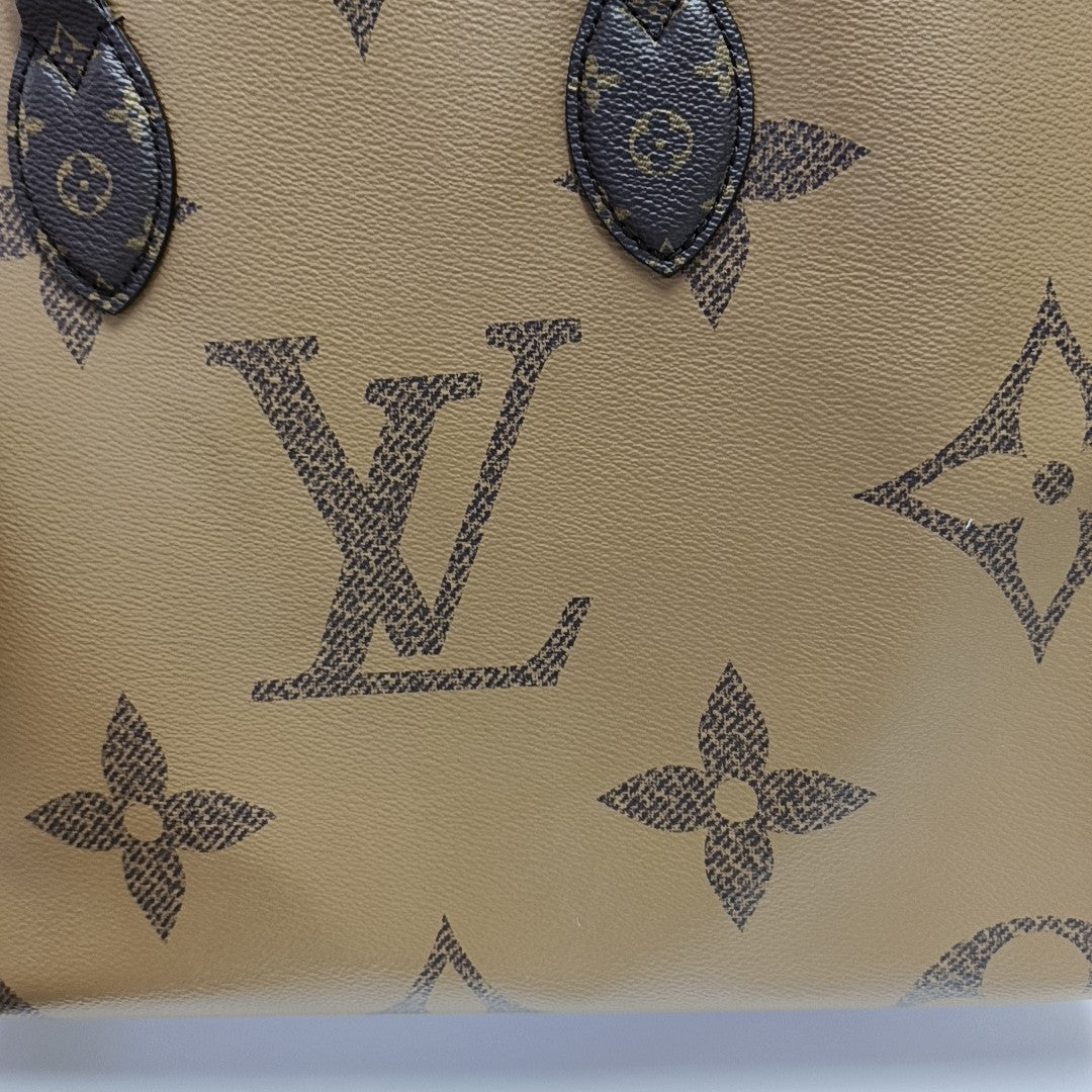 ONTHEGO MM Monogram Coated Canvas Brown