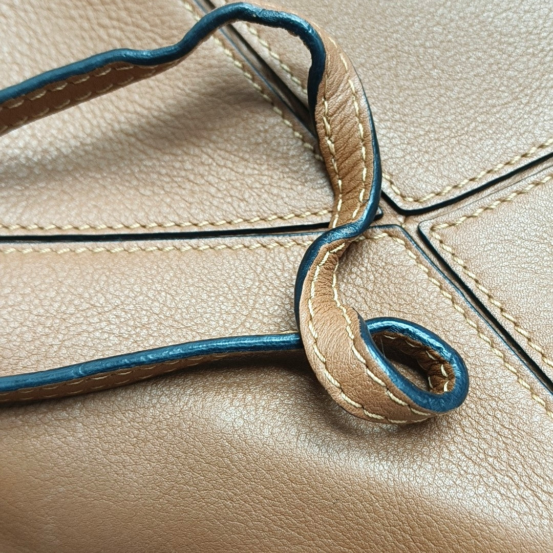 Authenticated pre-owned  Puzzle Mini Calfskin Brown - Crossbody Bag at Looply