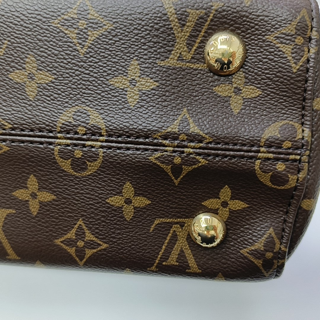 VÉNUS Monogram Coated Canvas Brown