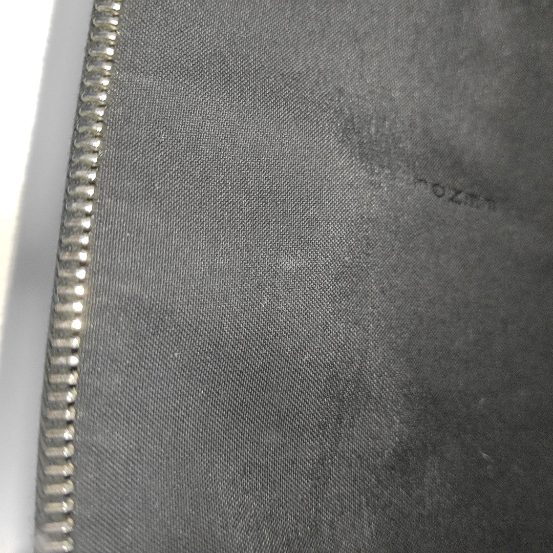 Authenticated pre-owned  Monster Calfskin Black - Clutch at Looply
