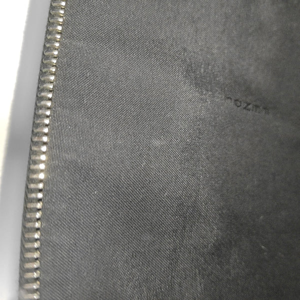 Authenticated pre-owned  Monster Calfskin Black - Clutch at Looply