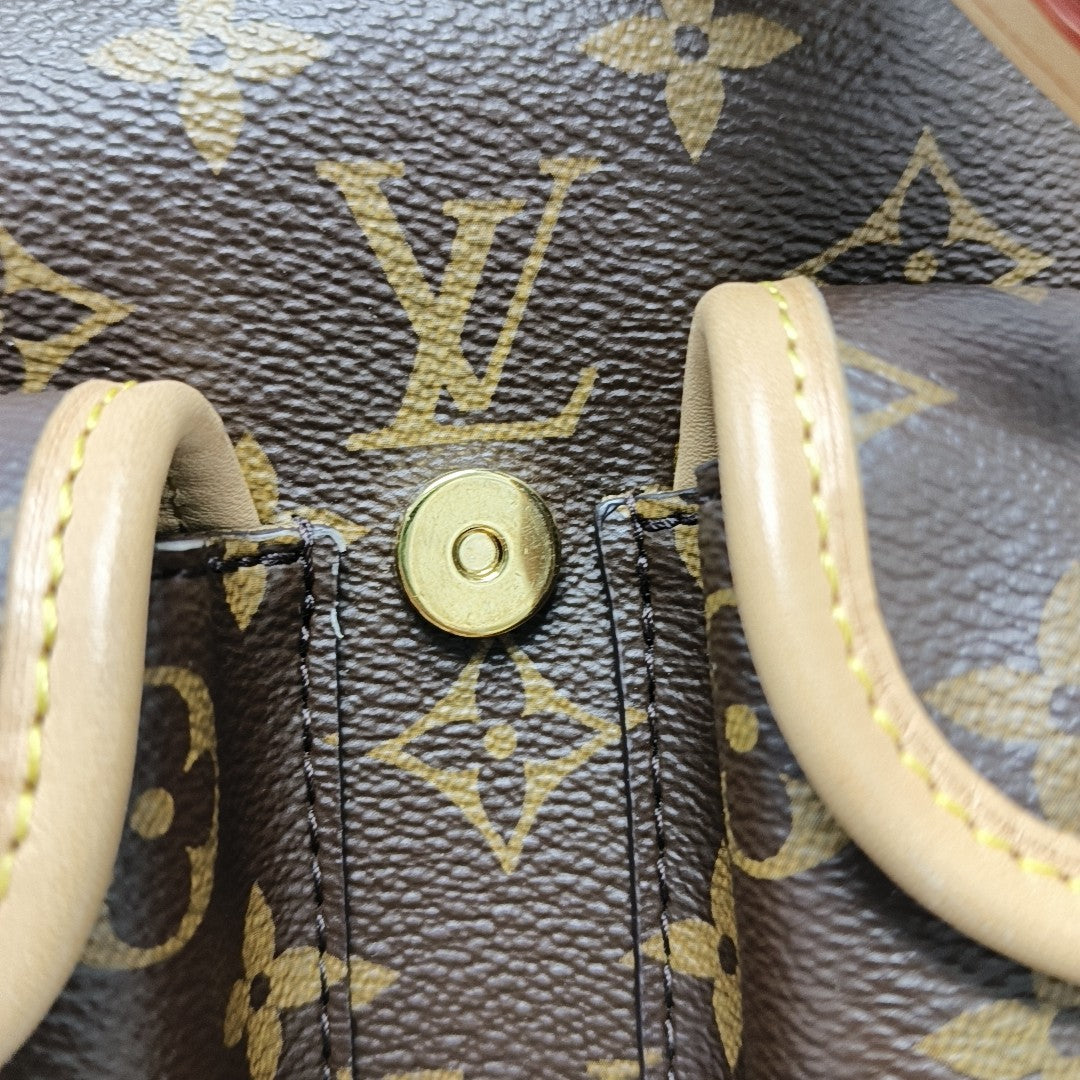 EXCURSION PM Monogram Coated Canvas Brown