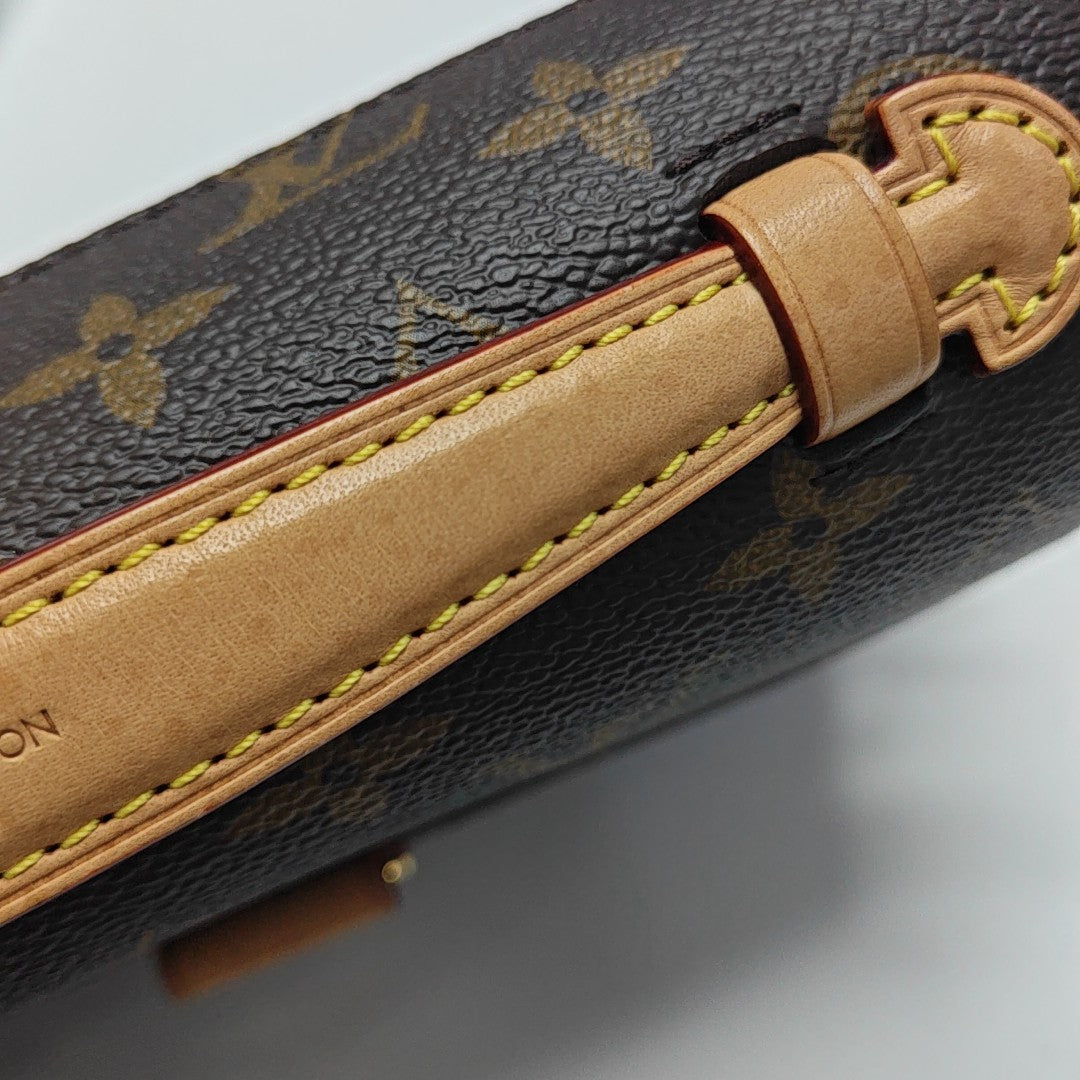 MÉTIS EAST WEST Monogram Coated Canvas Brown