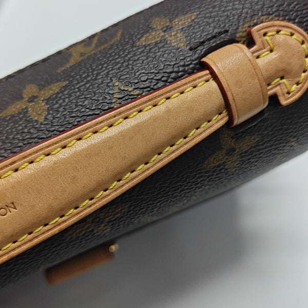 MÉTIS EAST WEST Monogram Coated Canvas Brown