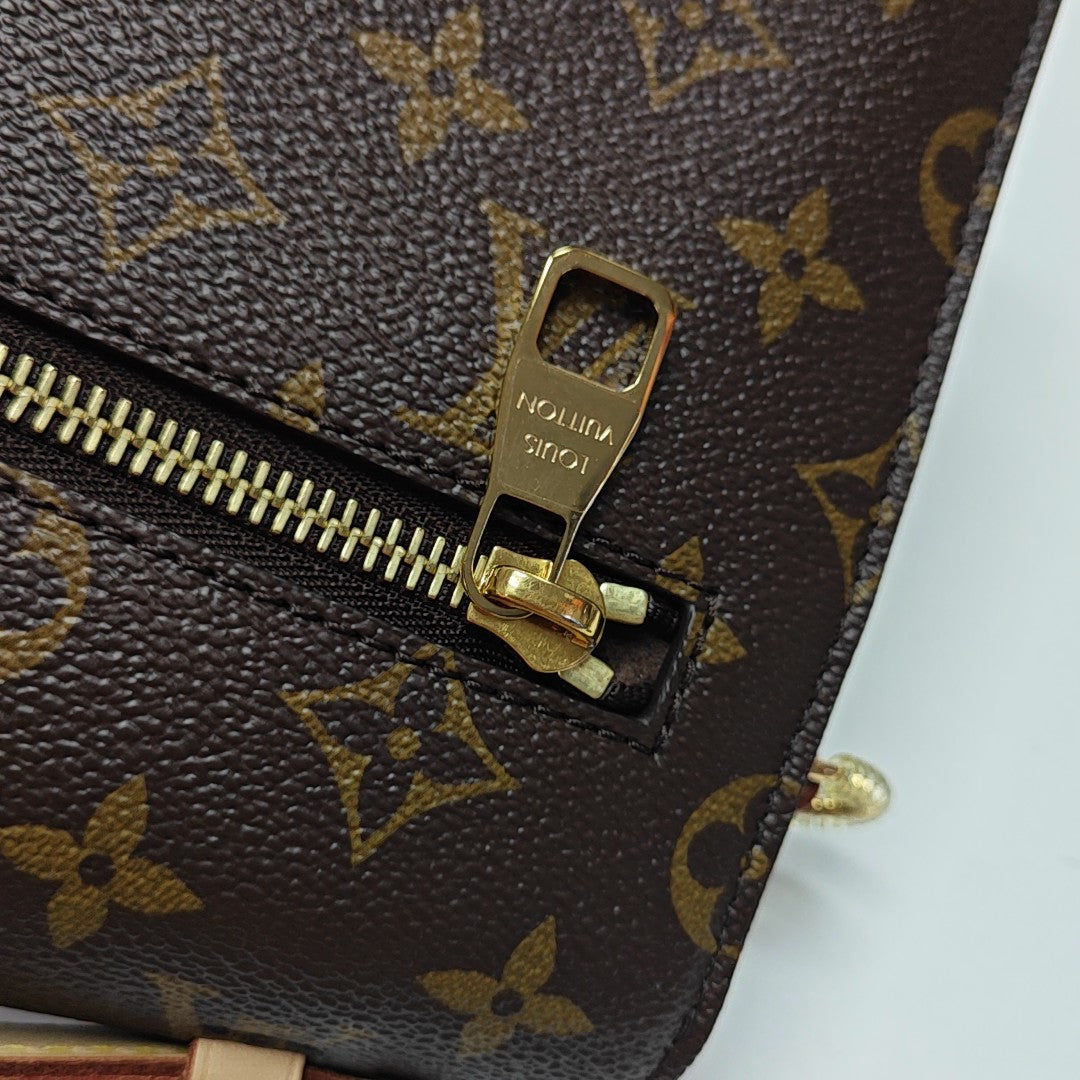MÉTIS MM Monogram Coated Canvas Brown