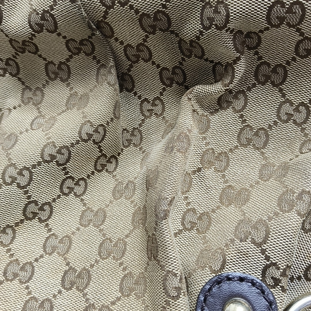 Sukey Monogram Canvas Brown