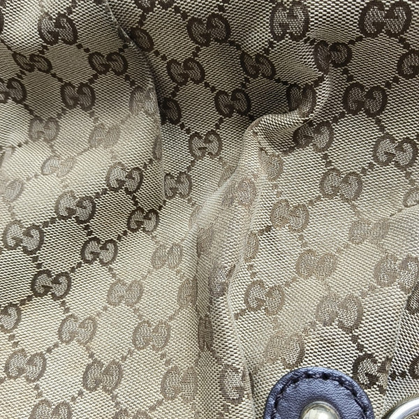 Sukey Monogram Canvas Brown