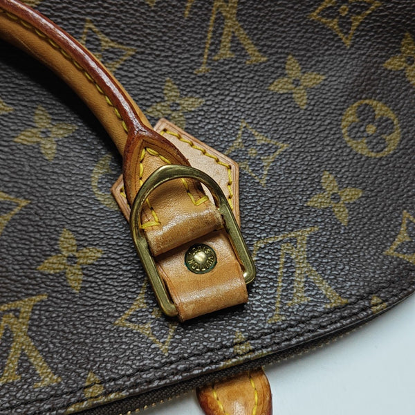 ALMA PM Monogram Coated Canvas Brown