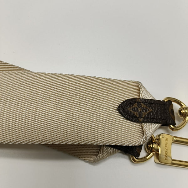 ONTHEGO PM Monogram Coated Canvas Brown