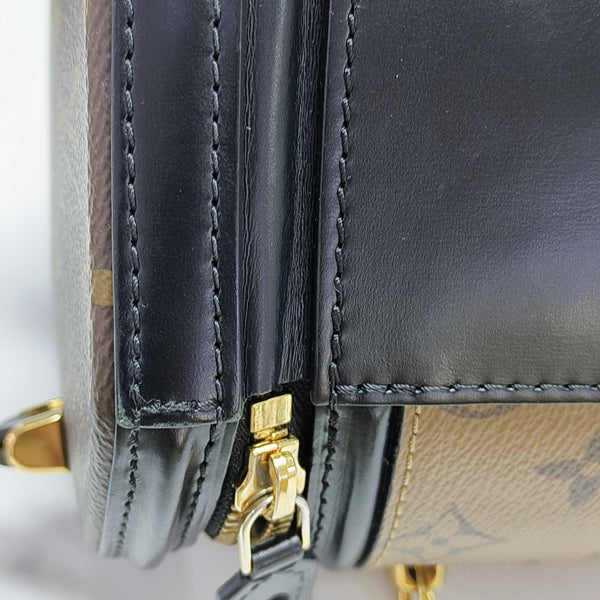 CANNES PM Monogram Coated Canvas Brown