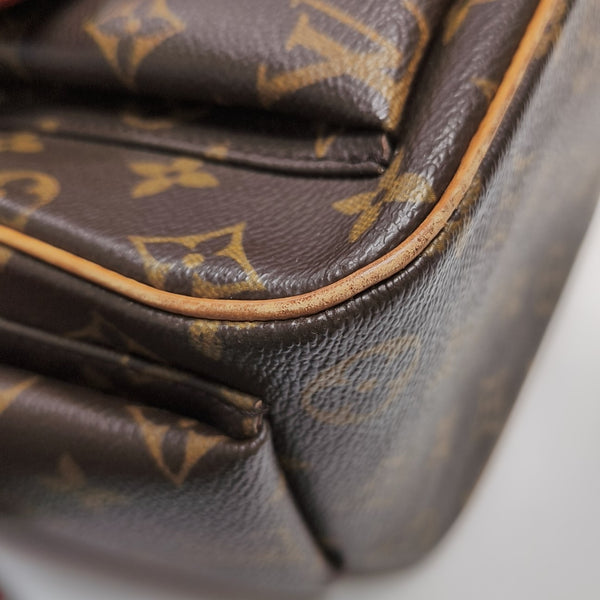 EXCENTRI-CITE Monogram Coated Canvas Brown