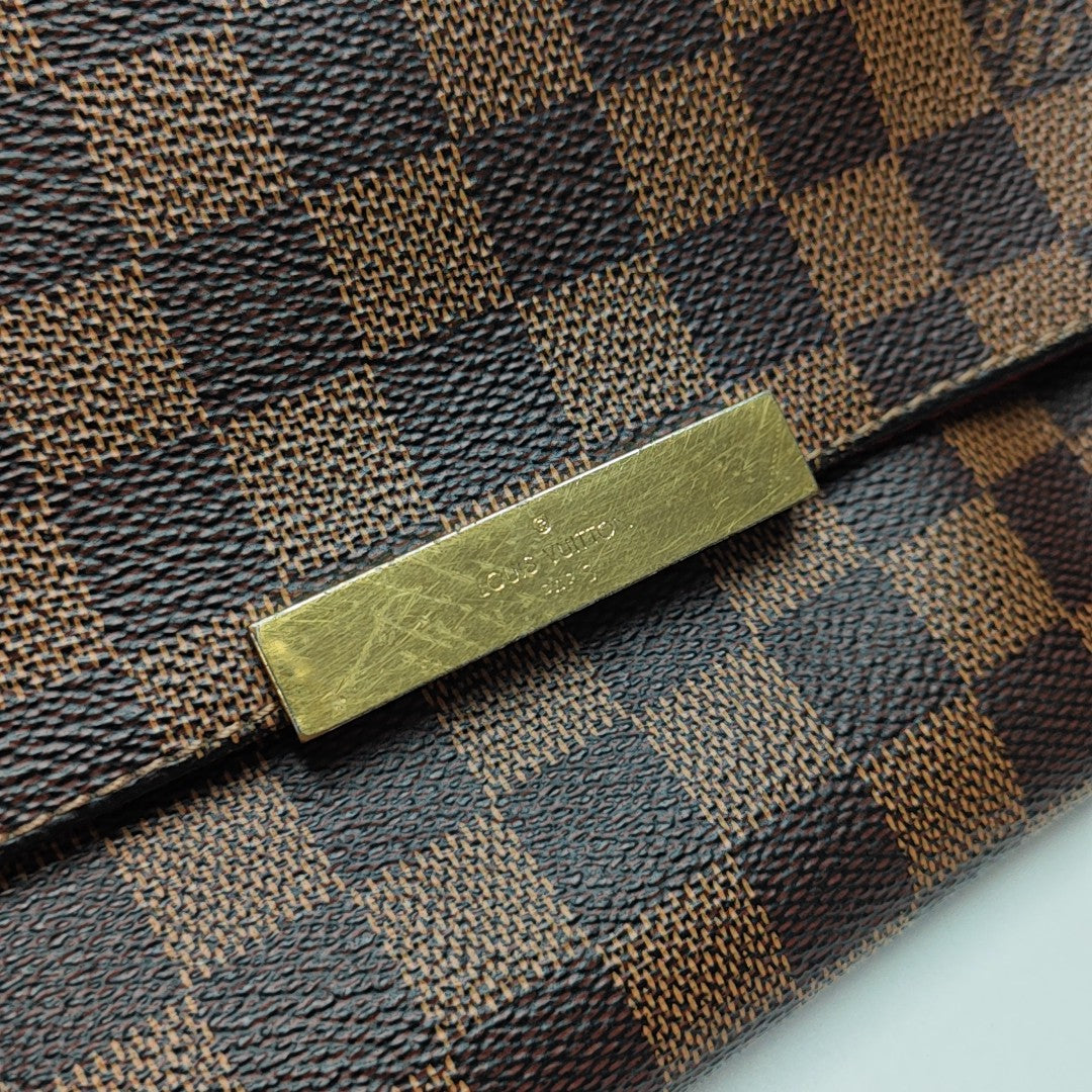 FAVORITE PM Damier Ebene Coated Canvas Brown