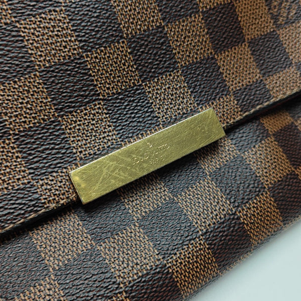 FAVORITE PM Damier Ebene Coated Canvas Brown
