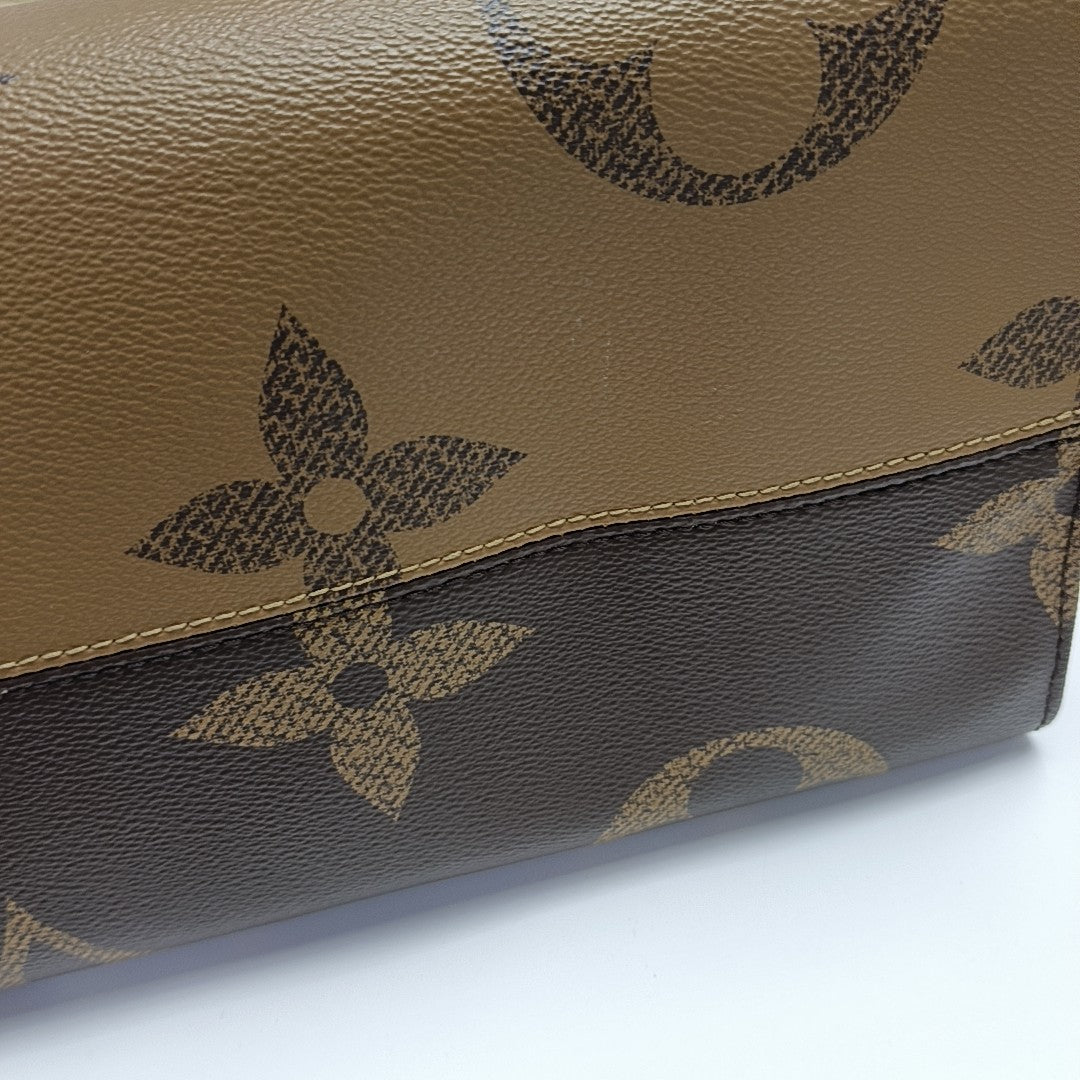 ONTHEGO GM Monogram Coated Canvas Brown